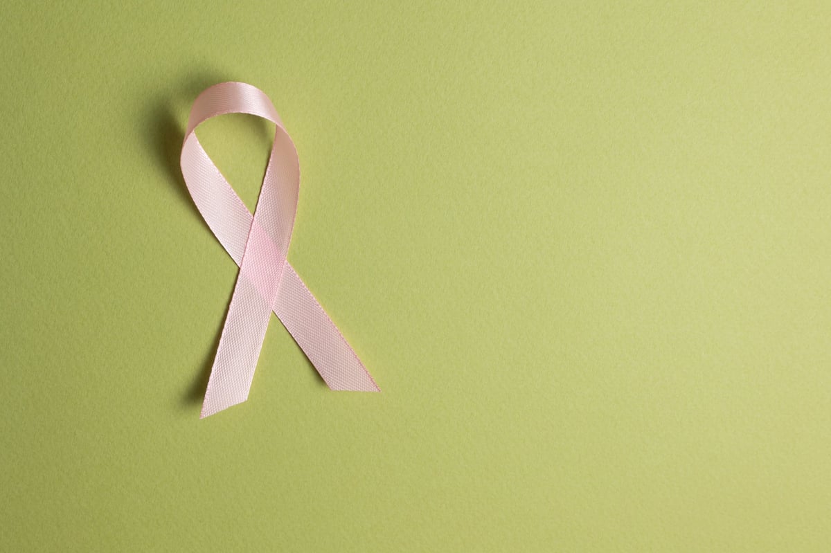 Pink awareness ribbon symbolizing breast cancer awareness, support, prevention and global health campaign